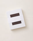 White box on white background. Brown product visible inside with two rectangle windows. Brand name Solly Baby on front.