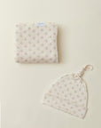 Image of Solly Baby's Blush Floret hat and swaddle set.