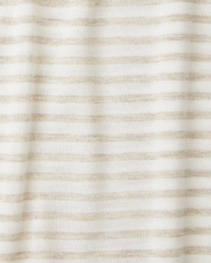 A close-up of a soft knit fabric with horizontal stripes in warm beige and off-white.