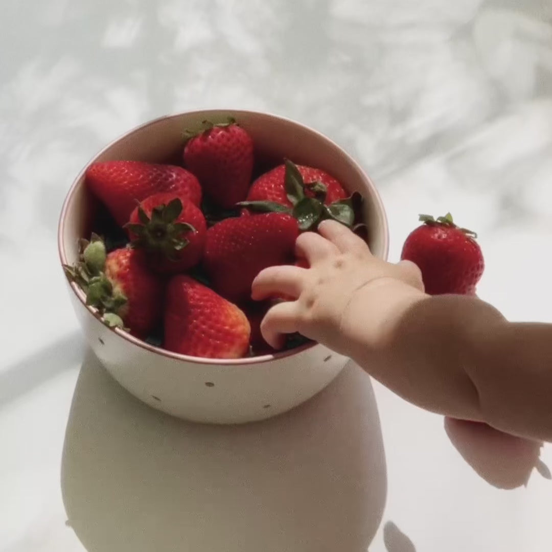 video of baby grabbing strawberries