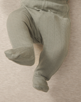 close up of a baby wearing mist pointelle pajama pants